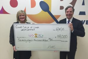 Ellen Lynch, president and CEO of The Food Bank for Westchester, with Eric Nodiff, founder and president of The Giving Circle of Lower Westchester Inc. Contributed photo