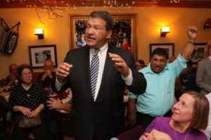 State Sen. George Latimer celebrates with supporters in Mamaroneck after hearing that he had clinched his
race against Julie Killian. Photo/Andrew Dapolite