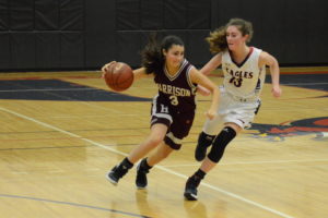 Avery LaBarbera tries to drive past Cassidy Mitchell at Eastchester High School. LaBarbera and Mitchell scored 22 and 20 points, respectively. Photos/Mike Smith