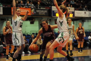 Gia Mancini drives to the basket against Irvington on Dec. 26. Mancini finished with 23 points and six rebounds in a 57-55 loss.  Photo/Bobby Begun