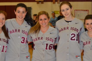 From left: Harrison captains Sydney Woolf; Stevie Carpinello; Christina DeCarlo; Adrianna Darcy and Elisa Arcara pose during an indoor practice session on March 18. The five seniors will look to lead Harrison on the field this year. Photo/Mike Smith