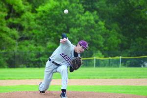 Mike Hendler throws a pitch against Eastchester in a May 20 first-round game. Hendler has won each of his two playoff starts.