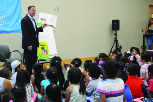 County Executive Robert P. Astorino reads to a group of pre-kindergarten students as part of his participation  in JCY-Westchester Community Partners’ summer reading program. Contributed photo