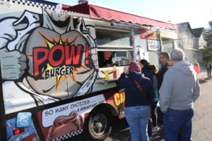 POW! Burger, a New Rochelle burger joint, drew long lines at the Mamaroneck Food and Truck Makers Market. Photo/Andrew Dapolite