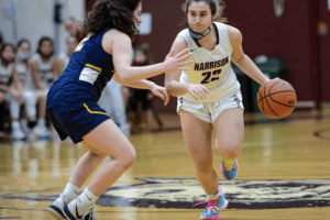 Mia Strazza beats a Pelham defender off the dribble on Feb. 5, 2022. Strazza returned to action against the Pelicans on Saturday after missing three games due to injury.