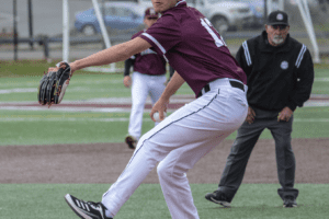 Luke Burden throws a pitch against Mamaroneck during a scrimmage on March 26, 2022. Burden will be one of Harrison’s top returning pitchers this season.