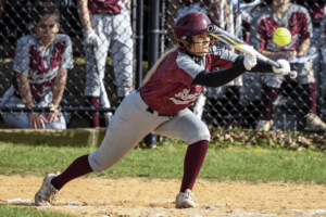 Ava Gurgitano lays down a squeeze bunt against Ursuline on April 12.