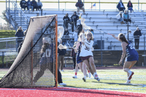 Caitlin Oestreicher scores a goal against New Rochelle on April 28, 2022. Oestreicher had six goals and three assists.