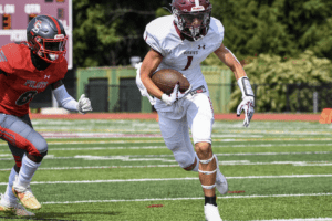 Joe Crupi changes direction against Cardinal Spellman on Sept. 3. Photos/Mike Smith