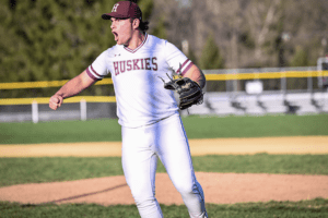 Anthony Engongoro celebrates a big out during Harrison's April 10 game against Tappan Zee. Engongoro would get the game-winning hit in the bottom of the seventh inning to lead the Huskies to a 3-2 win.