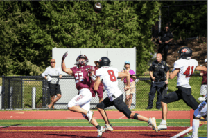 Michael Olsey hauls in the game-winning touchdown against Rye on Sept. 2.