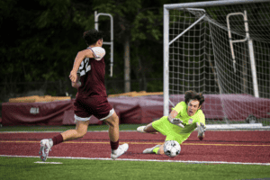 Max Grothall makes a save against the Huskies on Sept. 13. Photos/Mike Smith